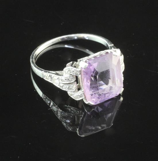 A 1920s/1930s platinum, amethyst and diamond ring, size O.